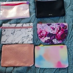 6 empty ipsy bags